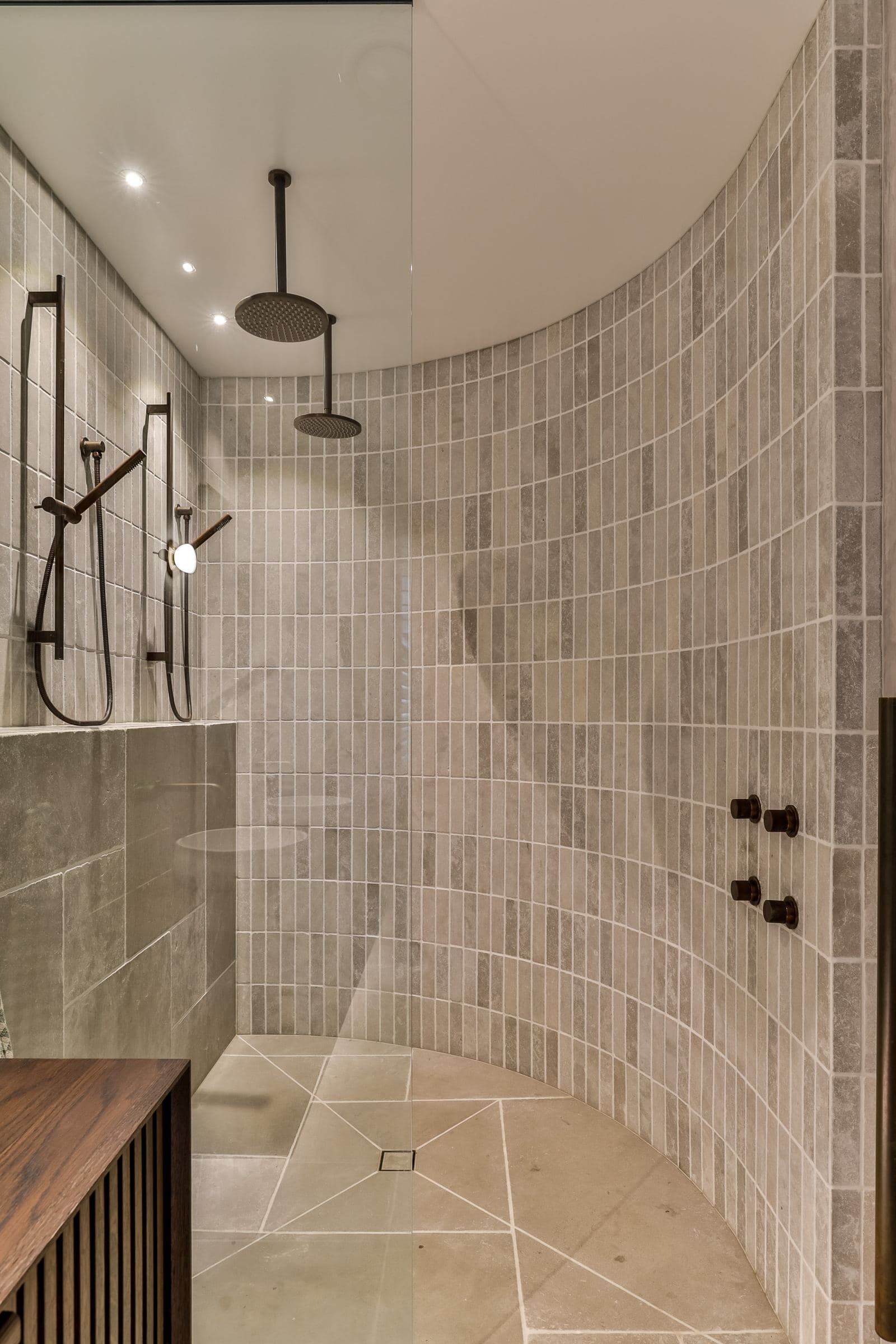 Inside the curved shower, showing the tile following the wall